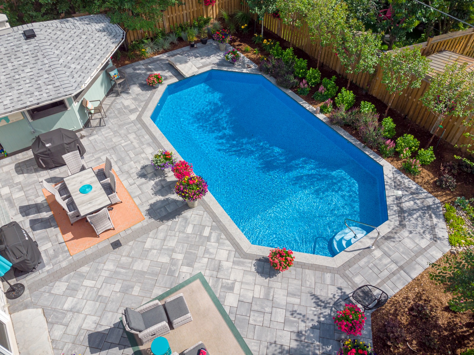 Aerial view of backyard pool and patio