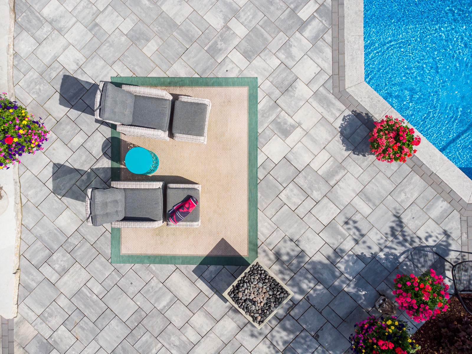 Overhead view of patio seating by pool