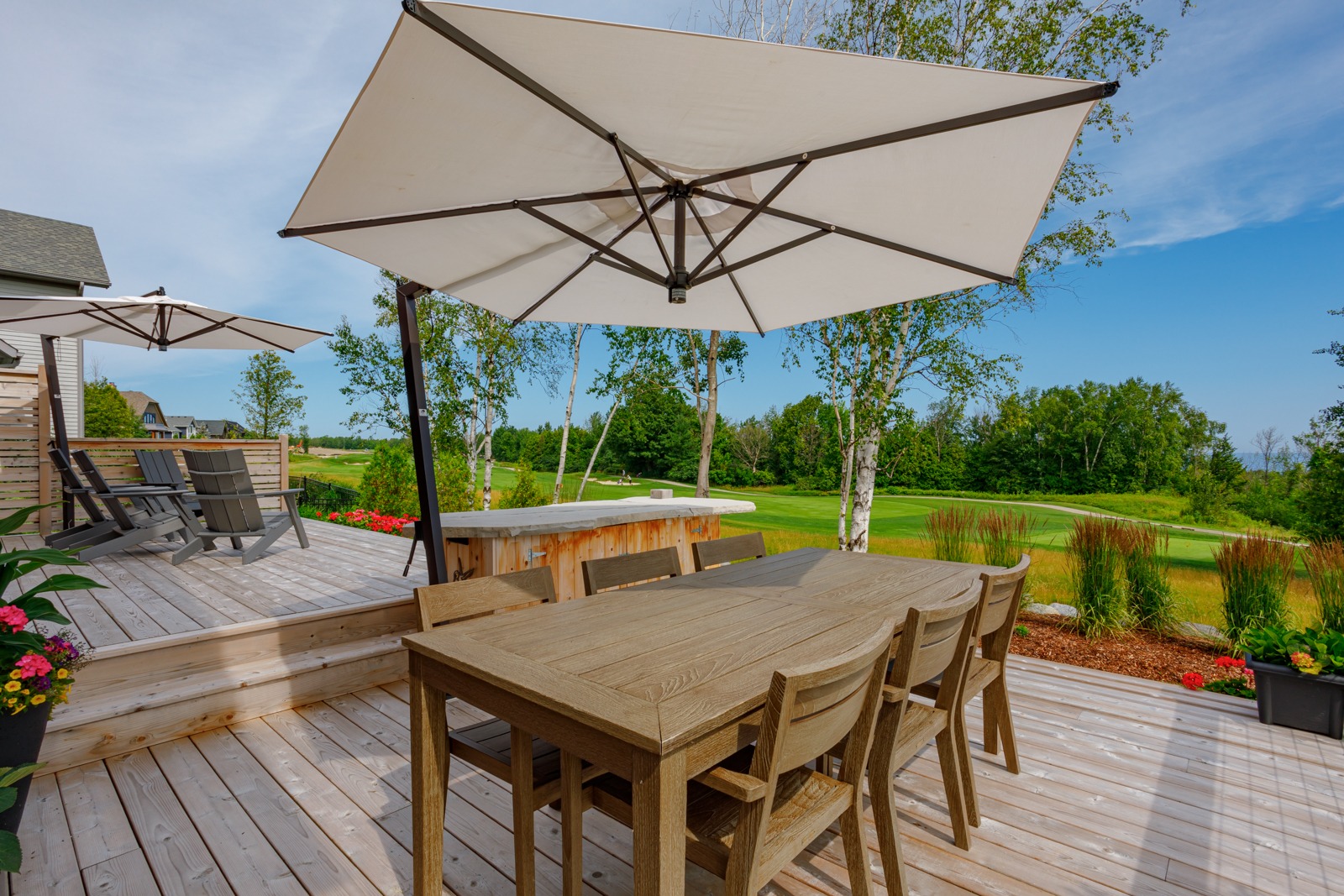 Wooden deck patio overlooking lush golf course