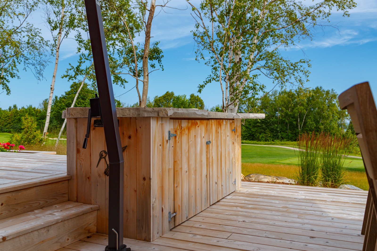 Wooden deck with outdoor storage box