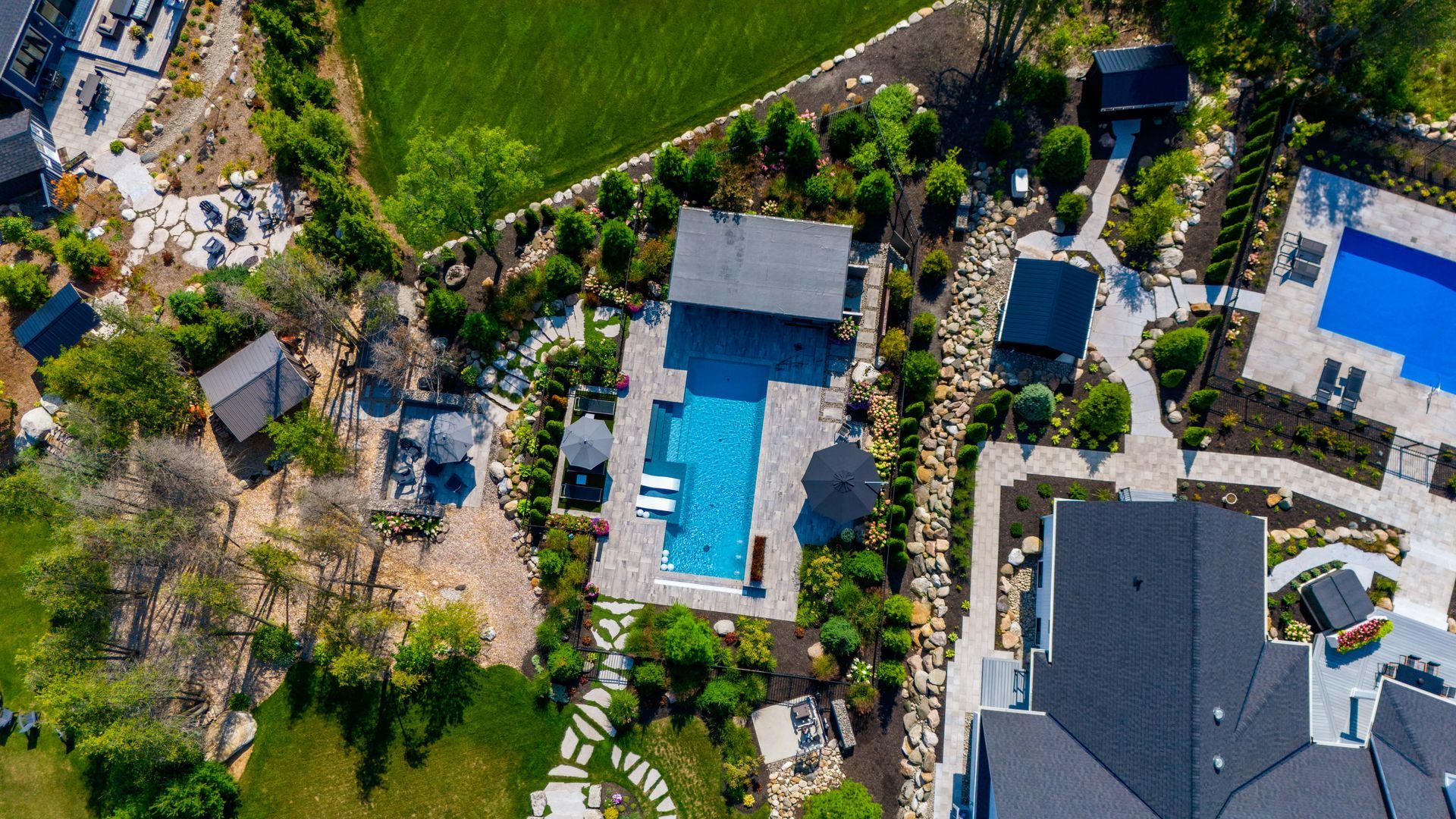 Aerial view of luxury backyard with pool