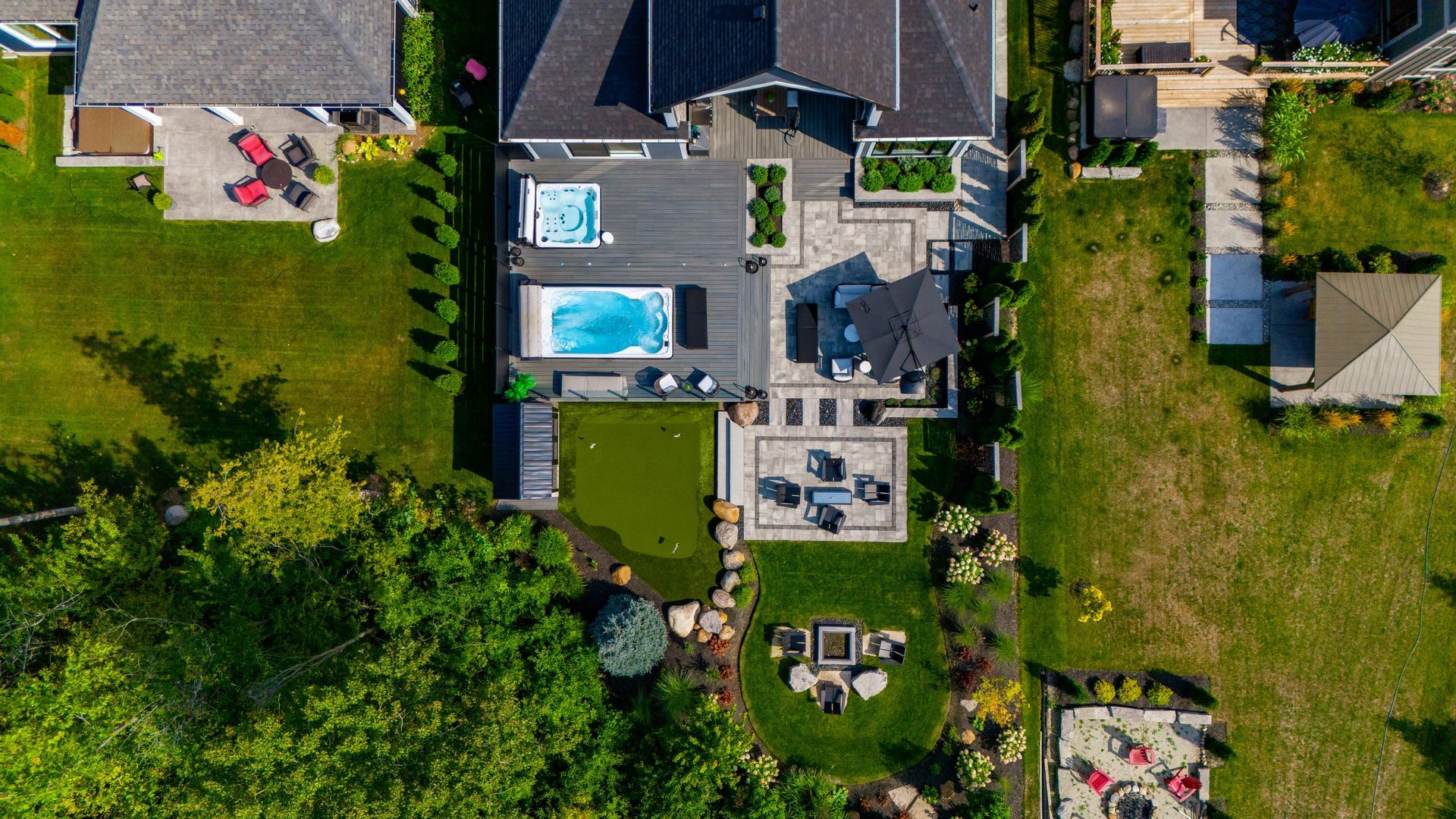 Aerial view of backyard with pool and patio